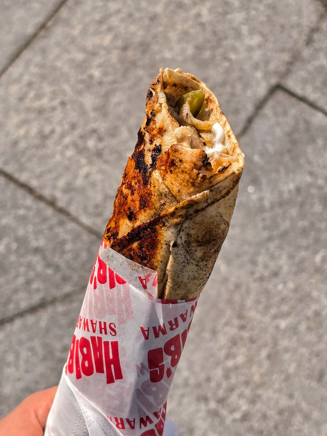Grilled chicken shawarma wrap in Habib’s paper